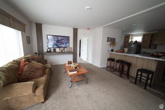 163 Eagle St, Eureka, UT 84628 - carpeted living area featuring ornate columns