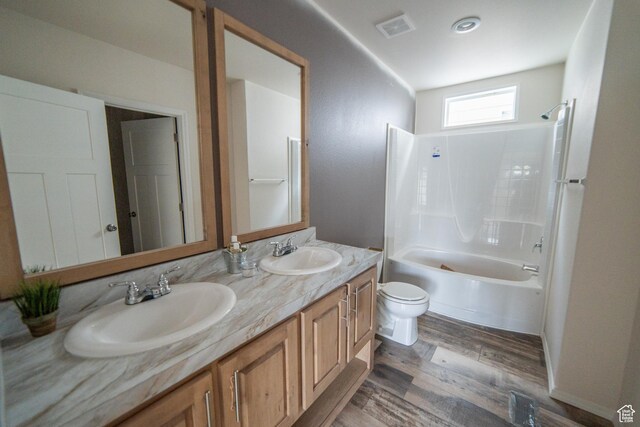 163 Eagle St, Eureka, UT 84628 - bathroom featuring toilet, wood finished floors, a sink, and visible vents