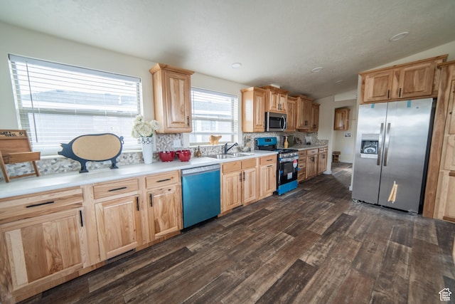 163 Eagle St, Eureka, UT 84628 - kitchen featuring tasteful backsplash, a sink, light brown cabinetry, stainless steel appliances, and dark wood-type flooring