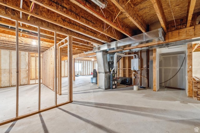 basement with heating unit and water heater