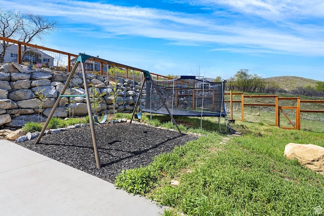 86 Elk Ridge Dr W, Elk Ridge, UT 84651 - view of yard featuring a trampoline and a playground