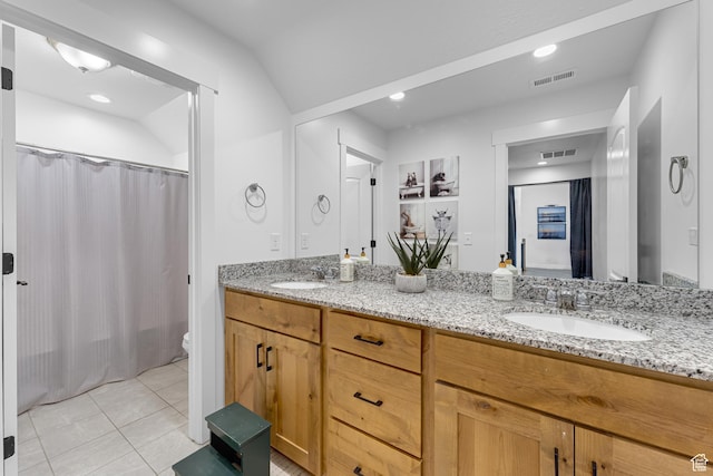 86 Elk Ridge Dr W, Elk Ridge, UT 84651 - bathroom with double vanity, toilet, and tile patterned floors