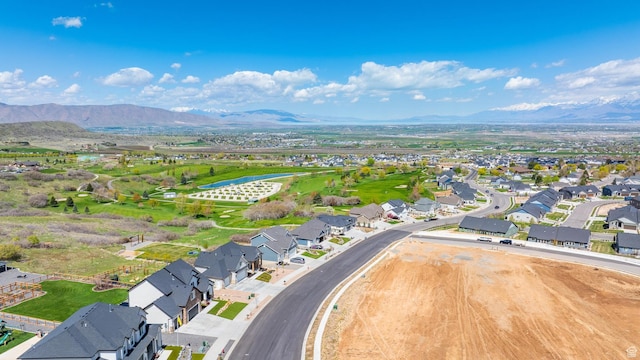 86 Elk Ridge Dr W, Elk Ridge, UT 84651 - aerial overview of property's location with nearby suburban area and a water and mountain view