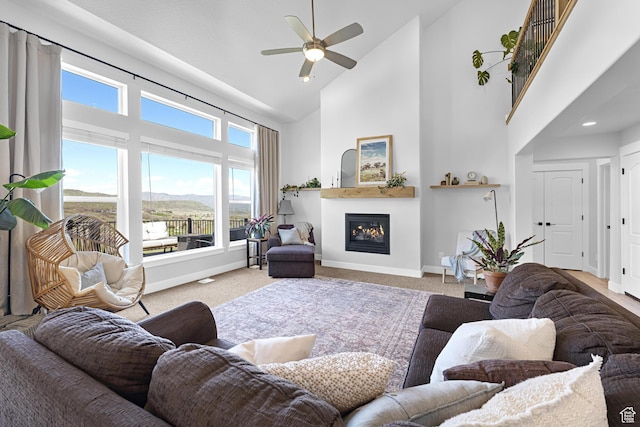 86 Elk Ridge Dr W, Elk Ridge, UT 84651 - living room featuring high vaulted ceiling, baseboards, ceiling fan, and carpet floors