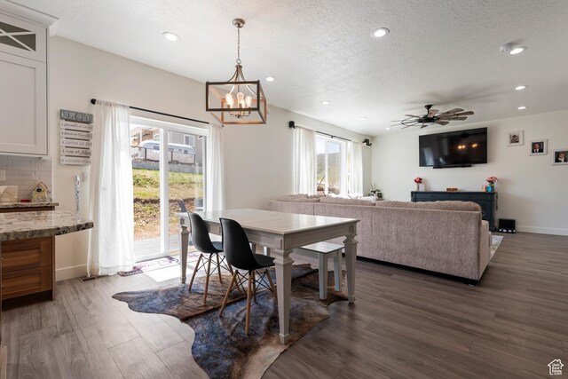 285 W Olympic Ln, Elk Ridge, UT 84651 - dining room with ceiling fan with notable chandelier, wood finished floors, a textured ceiling, and recessed lighting