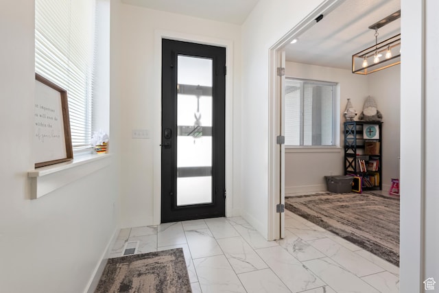 285 W Olympic Ln, Elk Ridge, UT 84651 - foyer with marble finish floor, baseboards, and visible vents