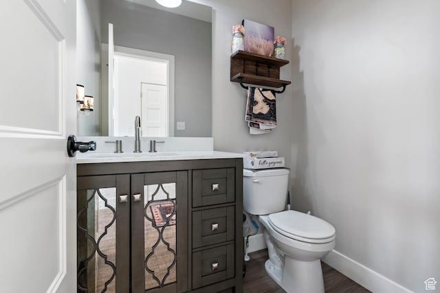 285 W Olympic Ln, Elk Ridge, UT 84651 - half bath with wood finished floors, baseboards, vanity, and toilet