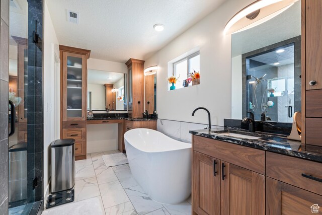 285 W Olympic Ln, Elk Ridge, UT 84651 - full bathroom with a shower stall, a sink, marble finish floor, a soaking tub, and visible vents