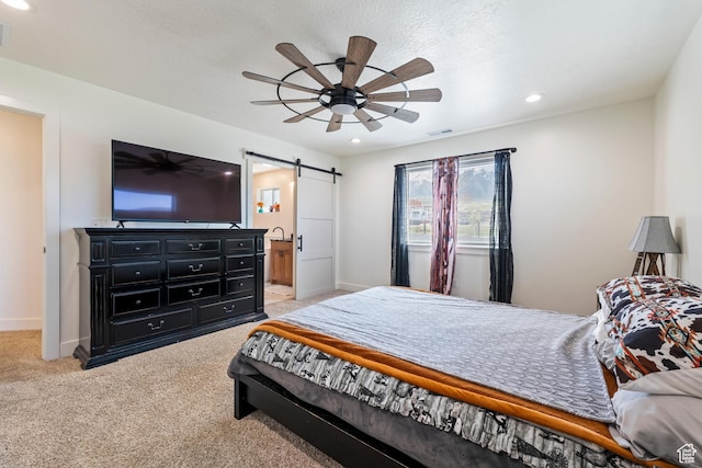 285 W Olympic Ln, Elk Ridge, UT 84651 - bedroom featuring a barn door, recessed lighting, visible vents, baseboards, and light colored carpet