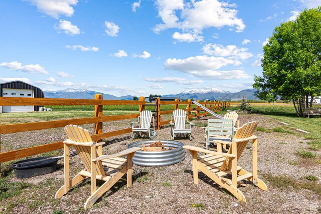 5186 W 9970 S, Payson, UT 84651 - view of yard featuring a fire pit, a mountain view, and a detached garage