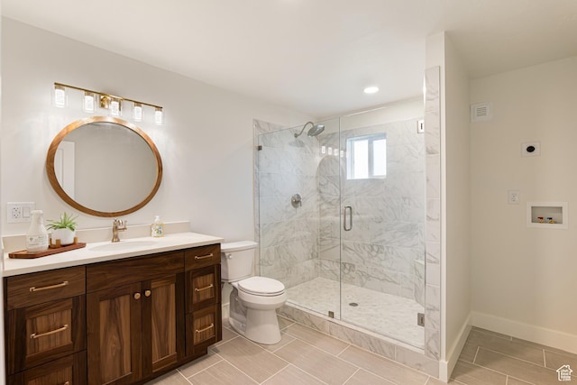 5186 W 9970 S, Payson, UT 84651 - full bathroom with a stall shower, toilet, vanity, baseboards, and recessed lighting