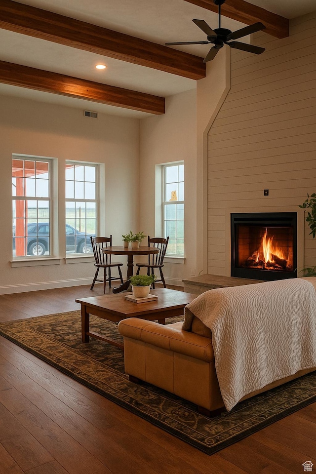 living room featuring recessed lighting, beamed ceiling, ceiling fan, and wood finished floors