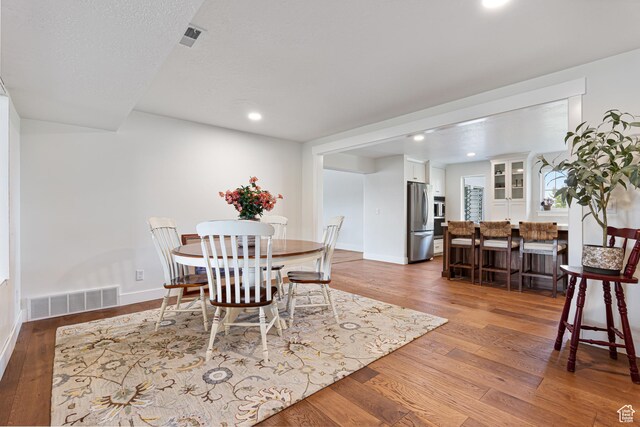 5186 W 9970 S, Payson, UT 84651 - dining area featuring wood finished floors, recessed lighting, and baseboards