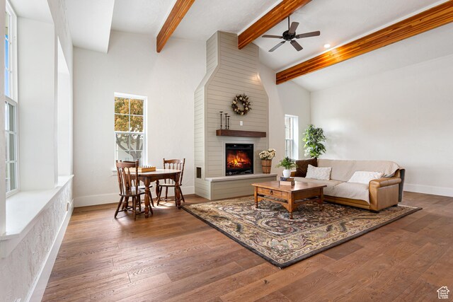 5186 W 9970 S, Payson, UT 84651 - living room featuring a ceiling fan, a large fireplace, wood finished floors, and baseboards