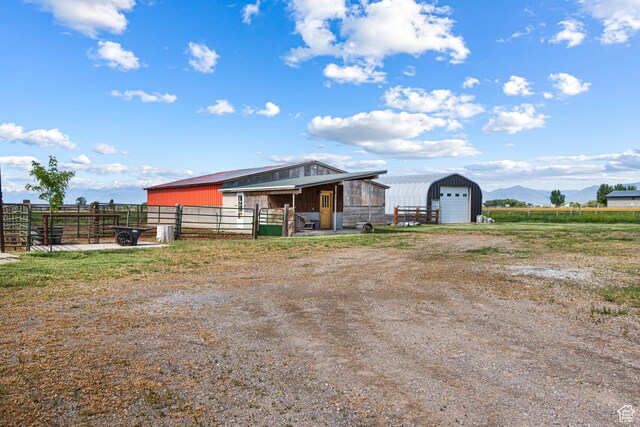 5186 W 9970 S, Payson, UT 84651 - view of pole building featuring a mountain view, an exterior structure, and dirt driveway