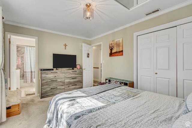 572 S Main St, Kaysville, UT 84037 - carpeted bedroom featuring ensuite bath, ornamental molding, visible vents, and a closet