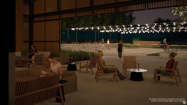 patio at twilight with an outdoor living space with a fire pit