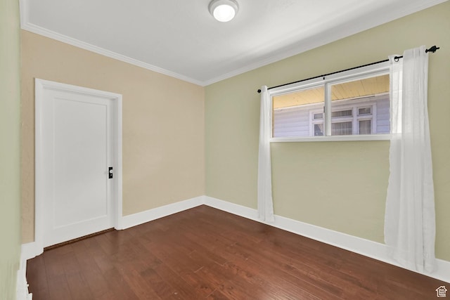 1248 26th St, Ogden, UT 84401 - spare room featuring baseboards, crown molding, and dark wood-style floors