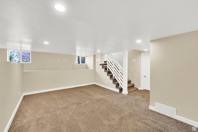 1248 26th St, Ogden, UT 84401 - basement with baseboards, carpet flooring, stairs, and visible vents