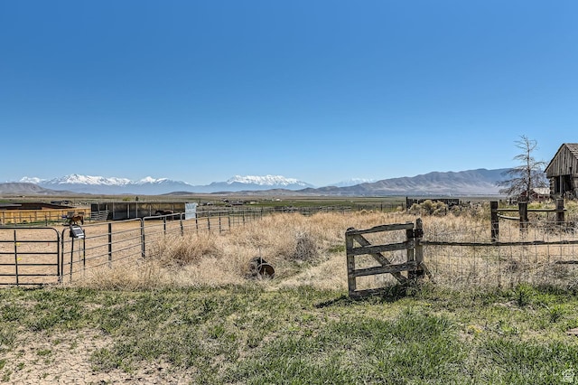 115 S 200 E, Cedar Fort, UT 84013 - view of yard featuring a rural view, an exterior structure, an outbuilding, and a mountain view