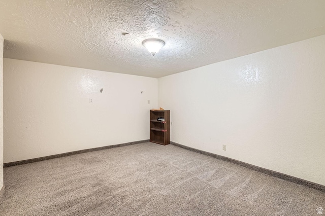 115 S 200 E, Cedar Fort, UT 84013 - spare room with baseboards, a textured ceiling, and light colored carpet