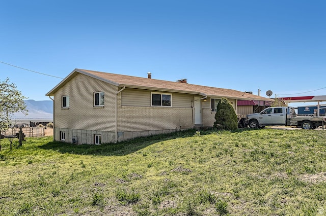 115 S 200 E, Cedar Fort, UT 84013 - ranch-style home with a front lawn, brick siding, and a mountain view