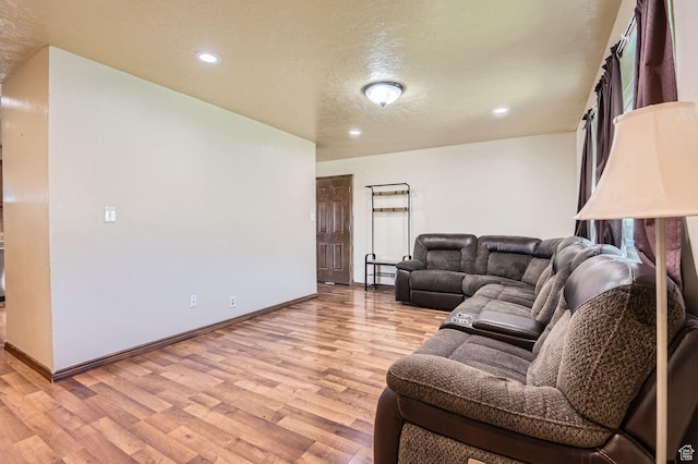 115 S 200 E, Cedar Fort, UT 84013 - living room featuring recessed lighting, light wood-style floors, a textured ceiling, and baseboards
