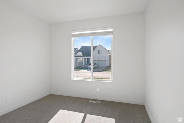 2414 N 4060 W, Lehi, UT 84043 - unfurnished room with baseboards, visible vents, and carpet