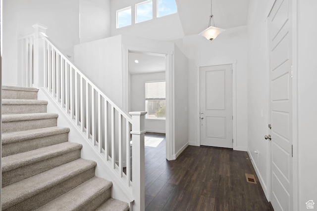 2414 N 4060 W, Lehi, UT 84043 - foyer entrance featuring plenty of natural light, a high ceiling, and dark wood-style floors