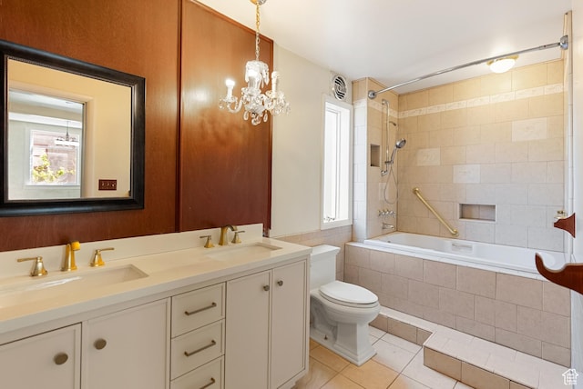 382 N 400 E, Logan, UT 84321 - bathroom with tiled shower / bath combo, toilet, tile patterned flooring, and a sink