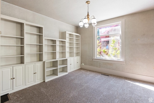 382 N 400 E, Logan, UT 84321 - unfurnished dining area featuring an inviting chandelier, carpet flooring, and visible vents