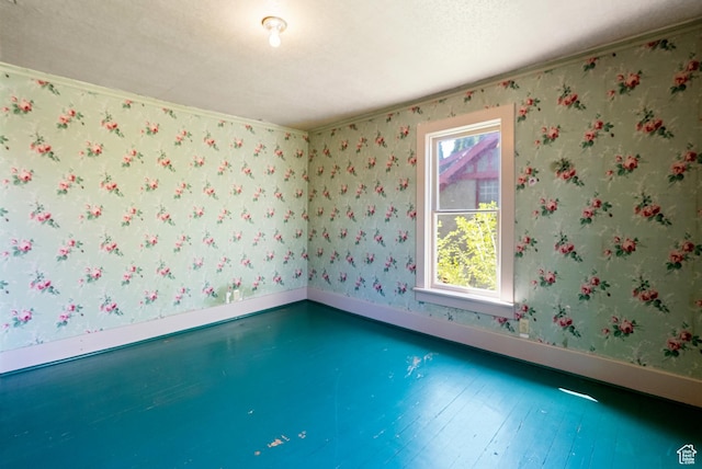 382 N 400 E, Logan, UT 84321 - spare room with baseboards, ornamental molding, and wood finished floors