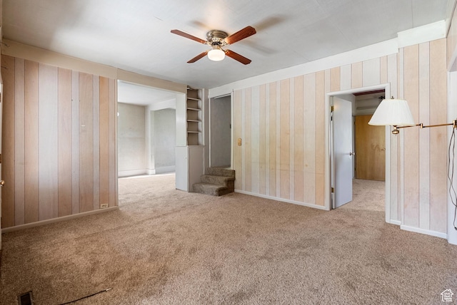 382 N 400 E, Logan, UT 84321 - carpeted empty room with wallpapered walls, stairway, baseboards, and ceiling fan