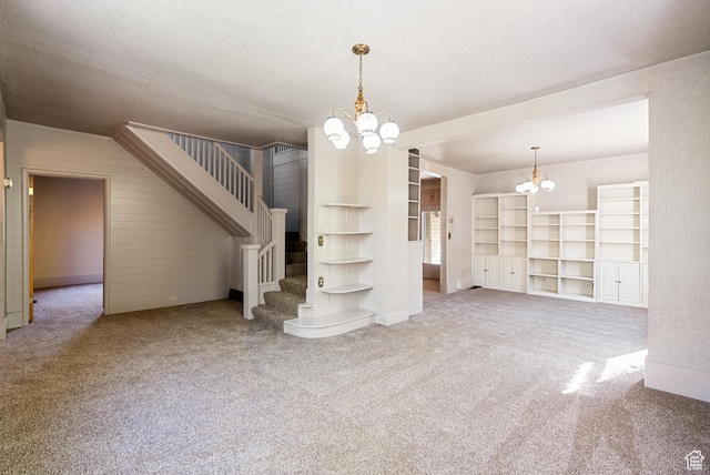 382 N 400 E, Logan, UT 84321 - interior space featuring baseboards, carpet floors, stairs, and a notable chandelier
