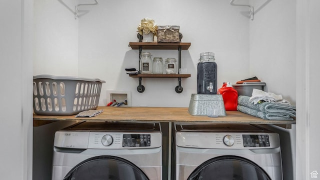 laundry area featuring washer and dryer and laundry area