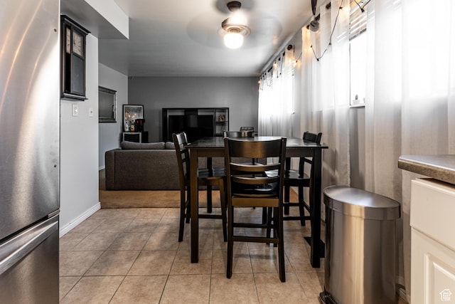 2220 E Murray Holladay Rd S Unit 128, Salt Lake City, UT 84117 - dining area featuring light tile patterned flooring