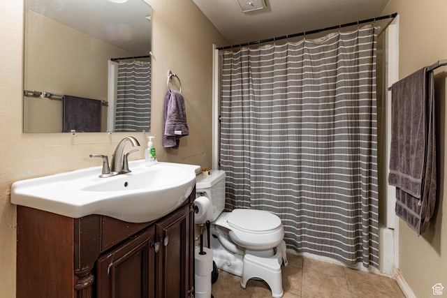 2220 E Murray Holladay Rd S Unit 128, Salt Lake City, UT 84117 - bathroom featuring visible vents, tile patterned flooring, vanity, and toilet