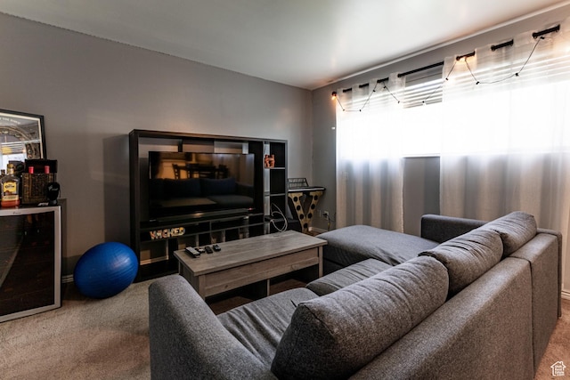 2220 E Murray Holladay Rd S Unit 128, Salt Lake City, UT 84117 - living area with baseboards, carpet flooring, a bar, and wine cooler