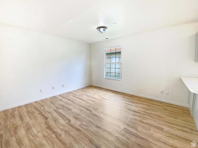 654 W 100 N, Spanish Fork, UT 84660 - empty room with light wood-style floors and baseboards