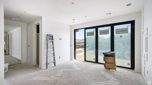 11606 S Halcom Dr, South Jordan, UT 84095 - doorway to outside featuring a mountain view and baseboards