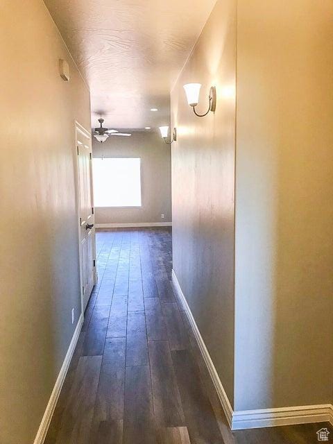 232 W 200 S, Ivins, UT 84738 - hall featuring baseboards and dark wood-type flooring