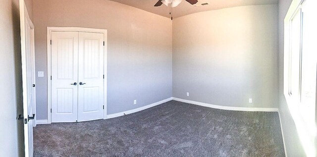 232 W 200 S, Ivins, UT 84738 - empty room with a ceiling fan, baseboards, lofted ceiling, dark colored carpet, and visible vents
