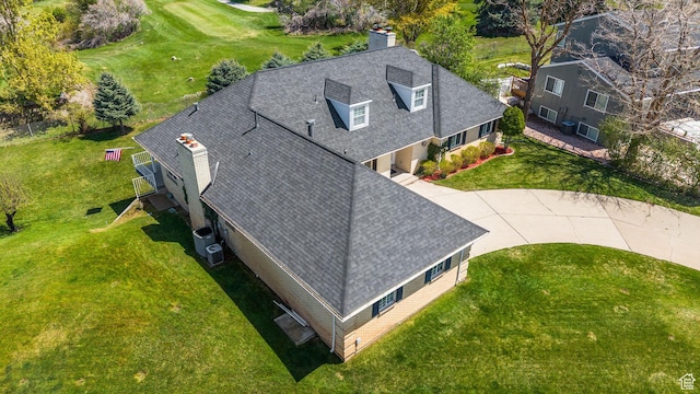 birds eye view of property with golf course view