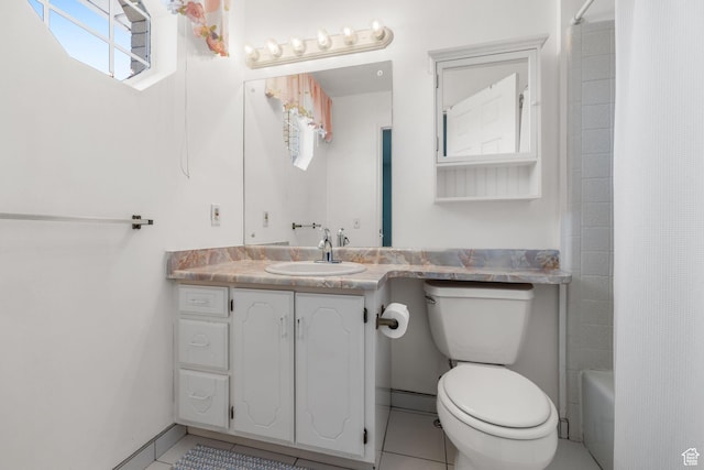 bathroom with vanity, toilet, tile patterned flooring, and shower / tub combo with curtain