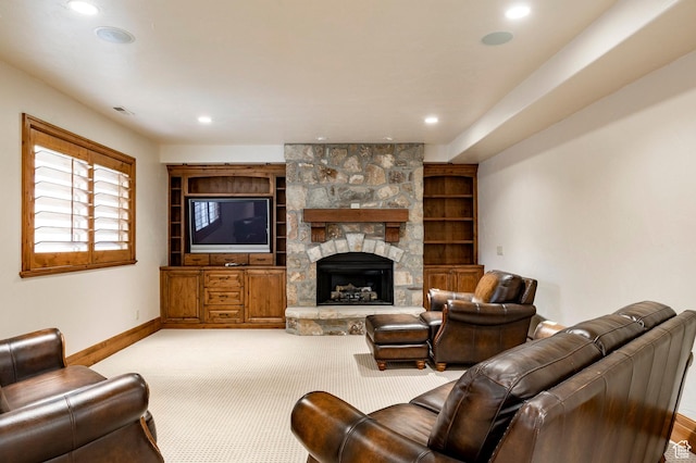 3143 E Bavarian Ct, Cottonwood Heights, UT 84093 - carpeted living area featuring a stone fireplace, baseboards, and recessed lighting