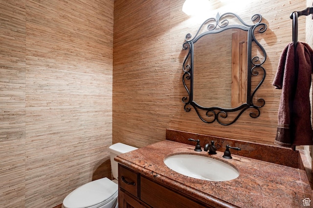 3143 E Bavarian Ct, Cottonwood Heights, UT 84093 - half bath featuring tile walls, toilet, and vanity