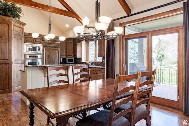 3143 E Bavarian Ct, Cottonwood Heights, UT 84093 - dining room featuring vaulted ceiling with beams, wood finished floors, and a chandelier