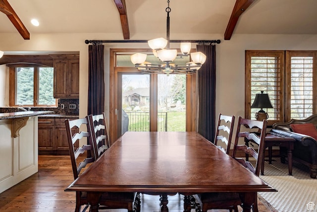 3143 E Bavarian Ct, Cottonwood Heights, UT 84093 - dining room with an inviting chandelier, wood finished floors, and beam ceiling