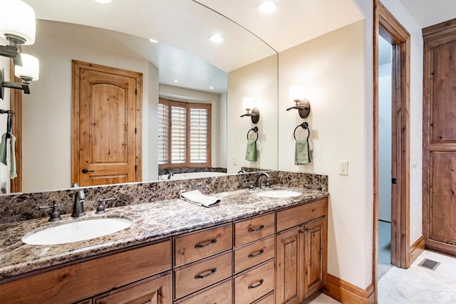 3143 E Bavarian Ct, Cottonwood Heights, UT 84093 - bathroom featuring visible vents, a sink, recessed lighting, and double vanity
