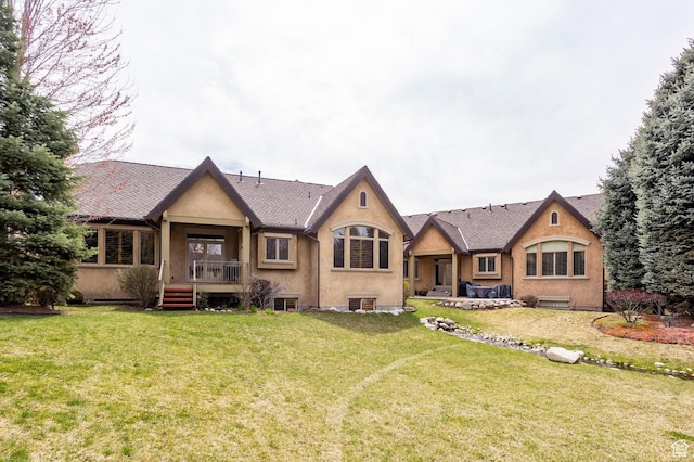 3143 E Bavarian Ct, Cottonwood Heights, UT 84093 - back of property with a yard and stucco siding